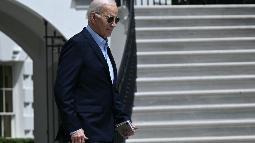 US President Joe Biden walks to Marine One on the South Lawn of the White House in Washington, DC